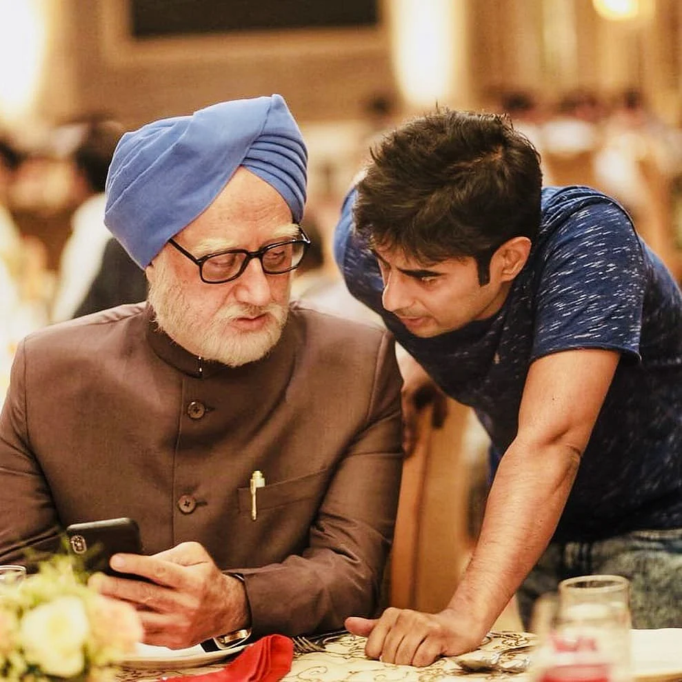 Anupam Kher and director Vijay Gutte on the sets on <i>The Accidental Prime Minister</i>.