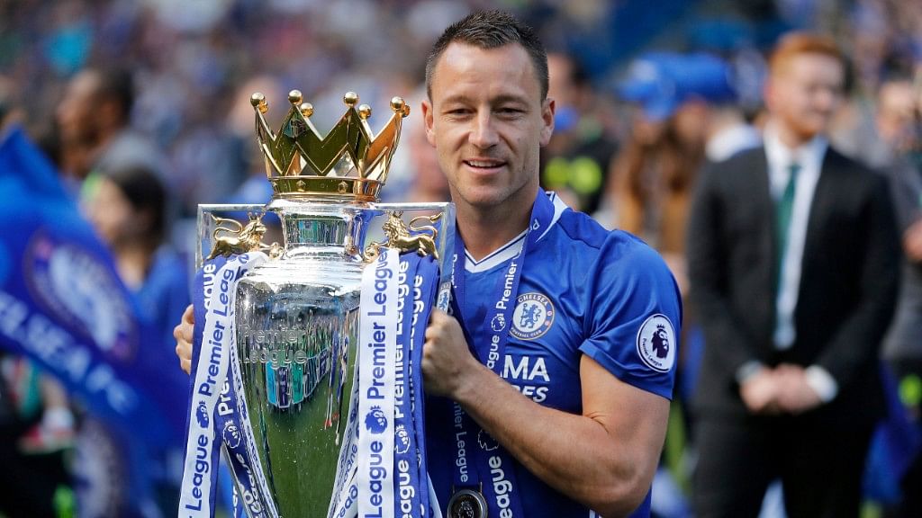  Chelsea captain John Terry wih the Premier League trophy after they won the league in 2017.&nbsp;
