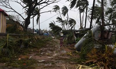 Odisha: Cyclonic storm Titli leaves houses damaged and trees uprooted at a village along Odisha-Andhra Pradesh border, on Oct 13, 2018.&nbsp;