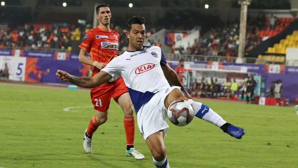 Bengaluru FC’S Miku scores the third goal for his side against FC Pune City on Monday. 