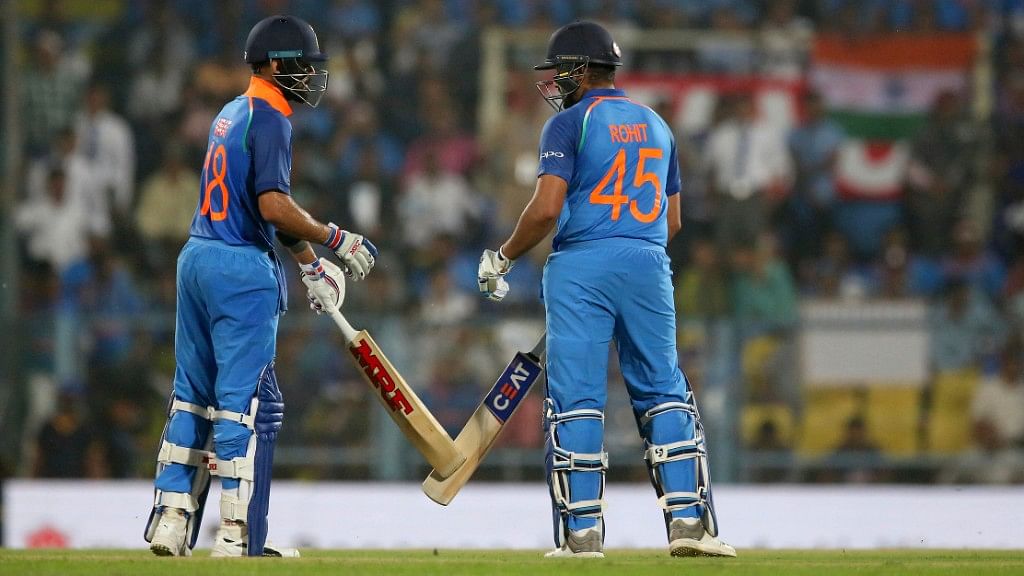 Virat Kohli (left) and Rohit Sharma in action against West Indies in the first ODI in Guwahati on Sunday.