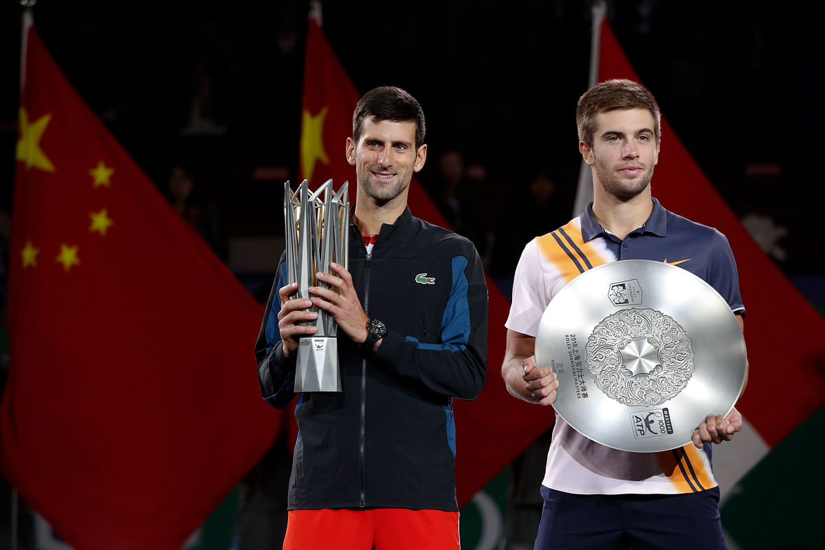 Novak Djokovic won a record fourth Shanghai Masters title with a 6-3, 6-4 win over 13th-seeded Borna Coric.