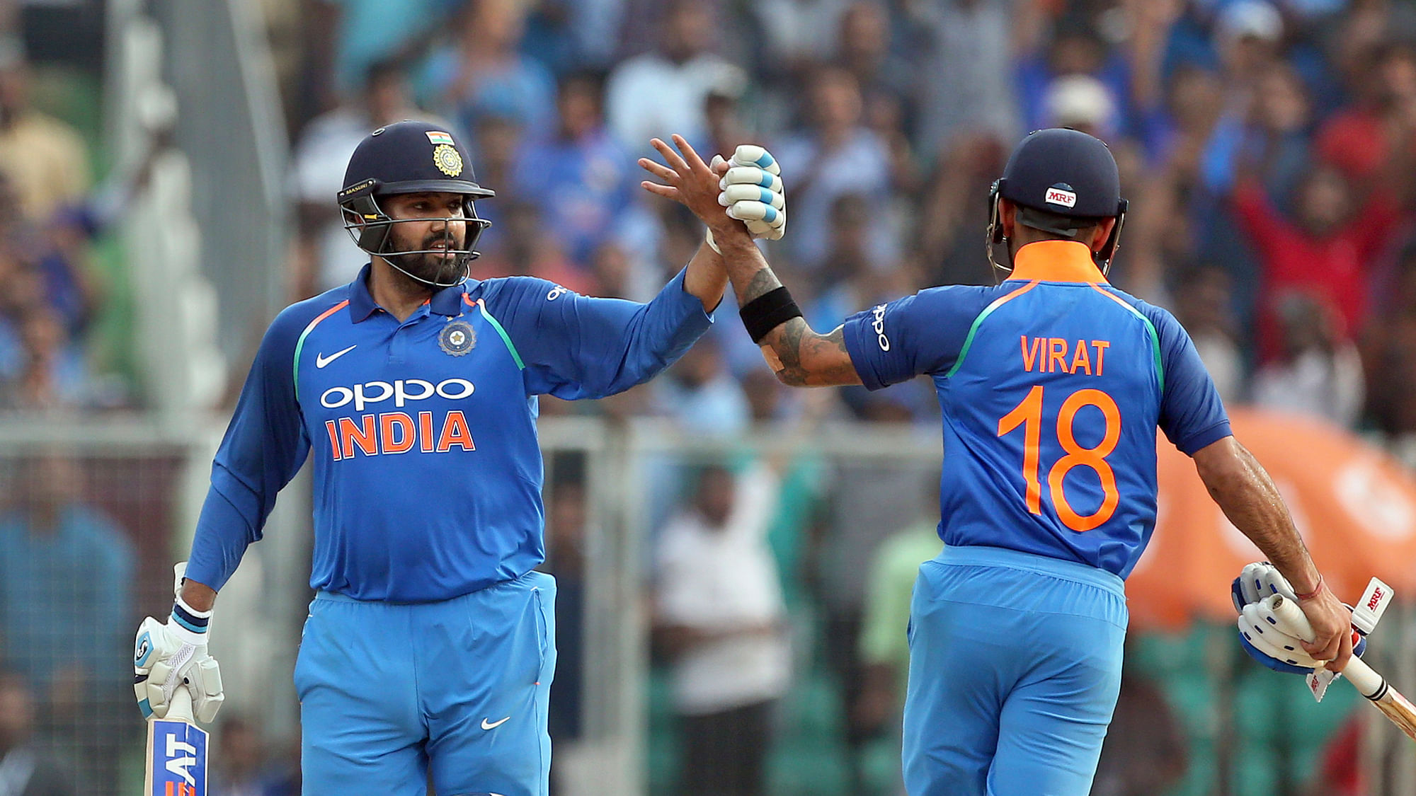 Rohit Sharma and Virat Kohli celebrate India’s victory over the Windies in the fifth ODI on Thursday.