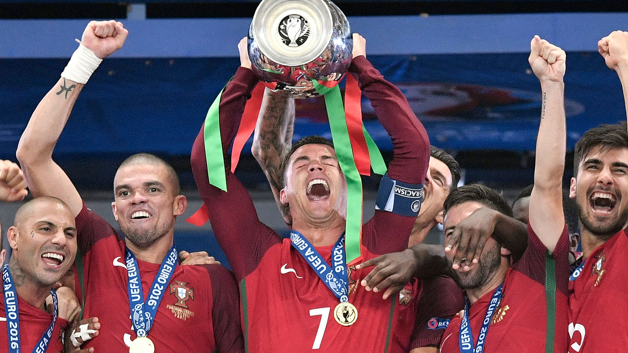  July 10, 2016: Portugal’s Cristiano Ronaldo holds the trophy at the end of the Euro 2016 final soccer match between Portugal and France at the Stade de France in Saint-Denis, north of Paris.&nbsp;