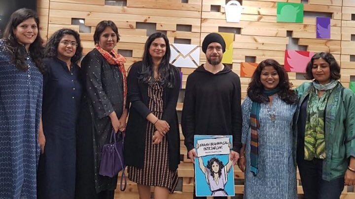 The photo that received all the backlash. Jack Dorsey can be seen holding the poster.