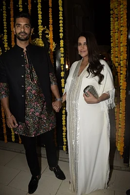 Mumbai: Actors Neha Dhupia and Angad Bedi during a Diwali party hosted by Ekta Kapoor at her residence in Juhu, Mumbai on Nov 6, 2018. (Photo: IANS)