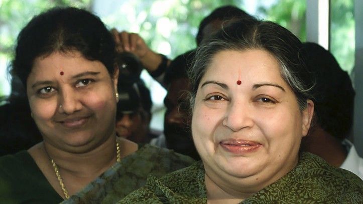 File photo of Jayalalithaa with her close aide VK Sasikala (background).
