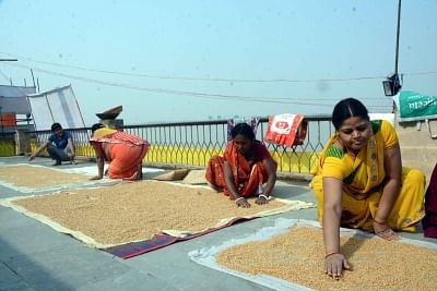 Patna: Women busy in the preparations of Chhath Puja ahead of the festival, in Patna on Nov 10, 2018. (Photo: IANS)
