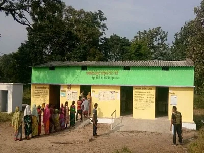 Sukma: Voters queue up outside a polling booth during the first phase of Chhattisgarh Assembly elections, in Sukma on Nov 12, 2018. (Photo: IANS)