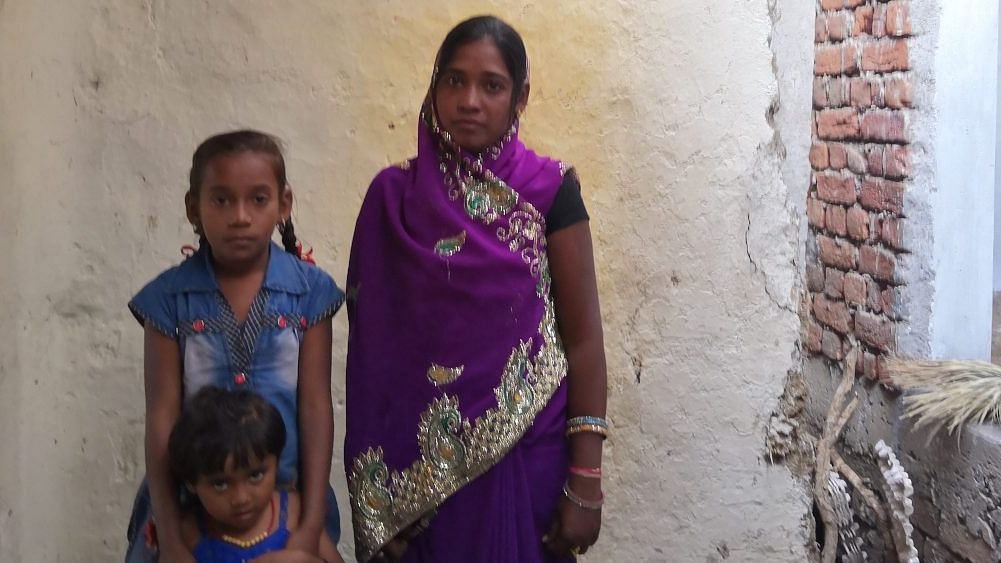 Kekti Verma with two of her three daughters. She is yet to receive any help from the government since her husband Dhal Singh Verma, a farmer, committed suicide in 2017 in Sararidih, Chhattisgarh. He had a loan of Rs 600,000.