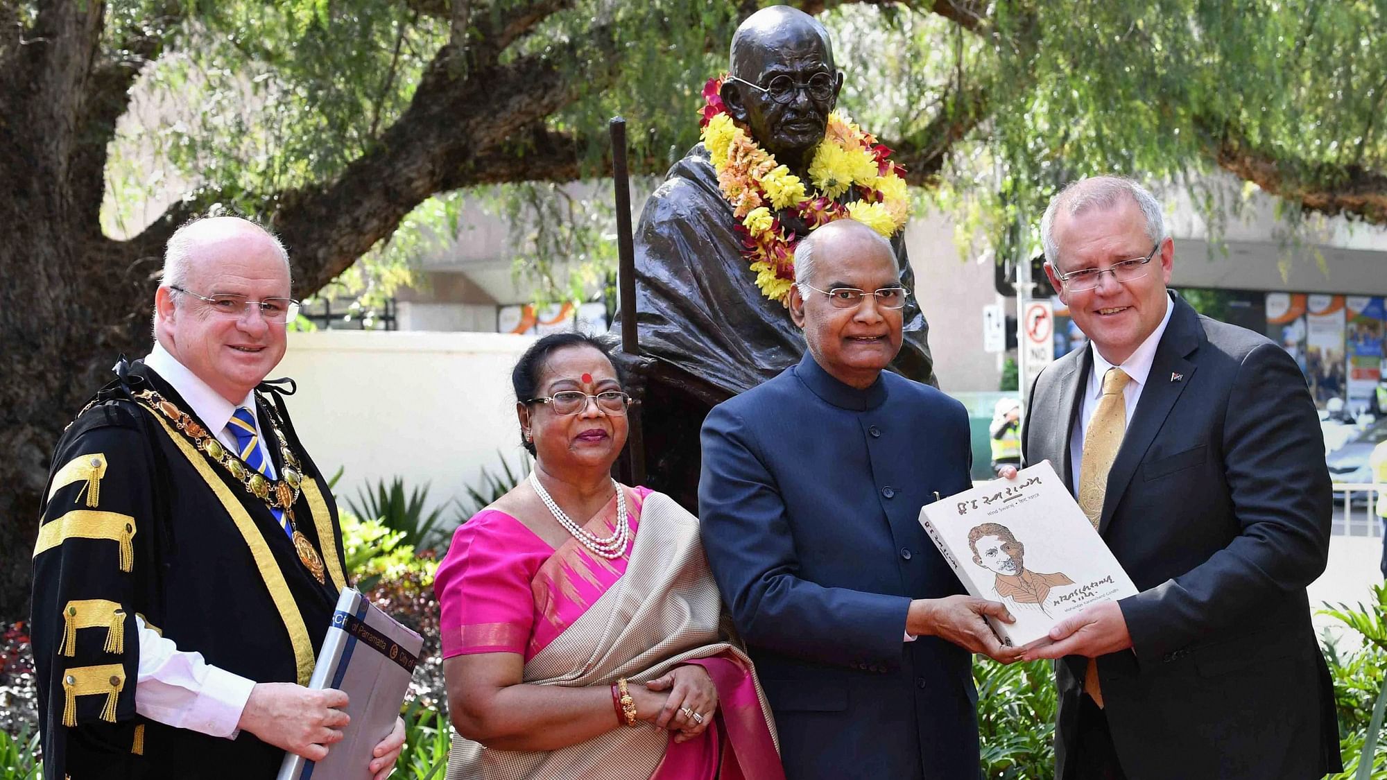 President Ram Nath Kovind (second from right), First Lady Savita Kovind, Parramatta Mayor Andrew Wilson, and Australian Prime Minister Scott Morrison (right) during the unveiling of the Mahatma Gandhi statue at Jublie Park in Sydney.