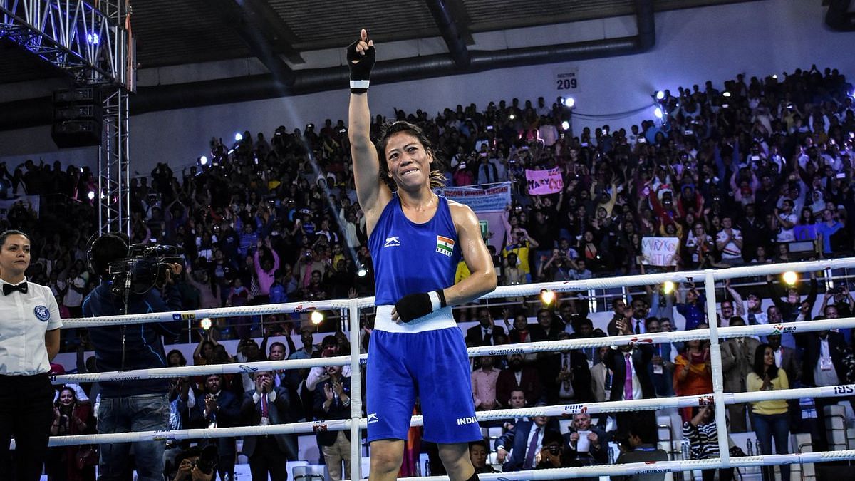 India’s MC Mary Kom celebrates after winning a historic sixth World Championship crown