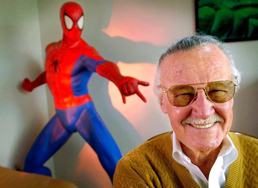 In this 16 April 2002 photo, Stan Lee smiles during a photo session in his office in Santa Monica, California. 
