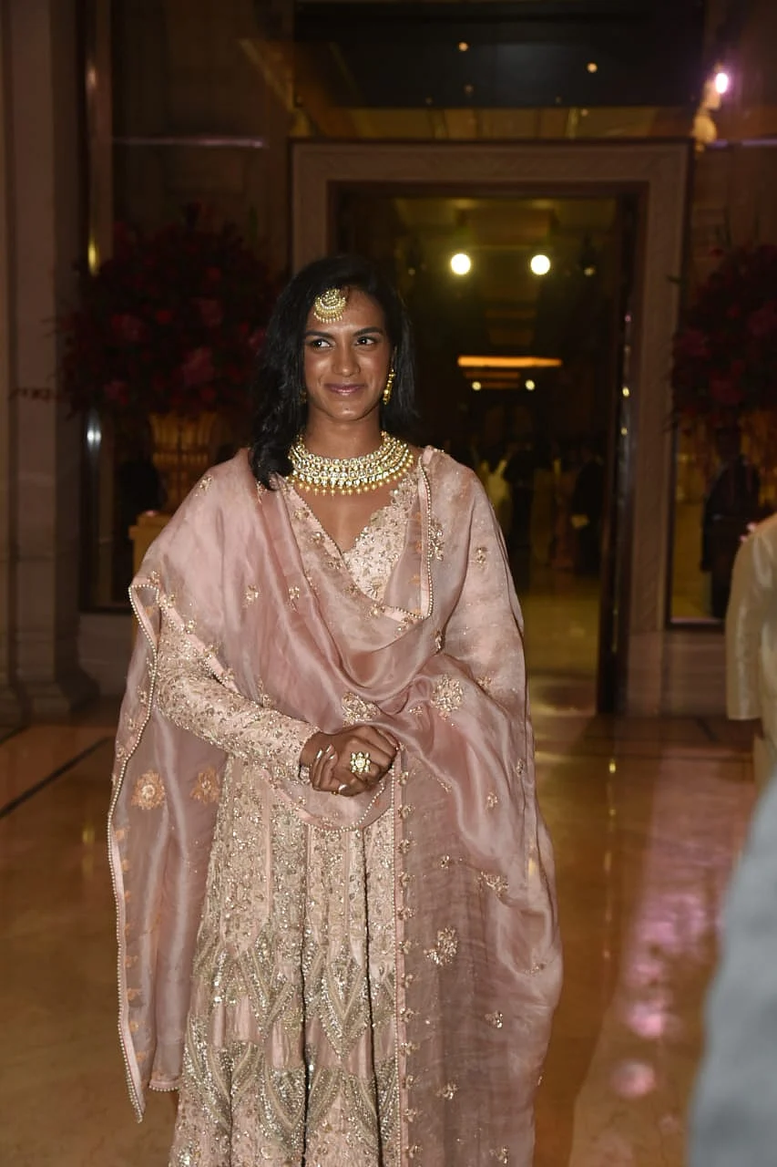 PV Sindhu arrives at The Leela Palace dressed in pink.