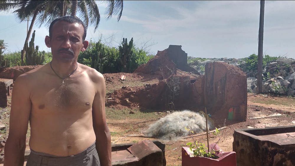 Budhwant Karvi, 40, visits the remains of his old home in Pavinarkurve village in Honnavar, Karnataka, on festivals and special occasions. To stop the erosion, the government constructed a stone wall, but it wasn’t enough to hold back the waves.