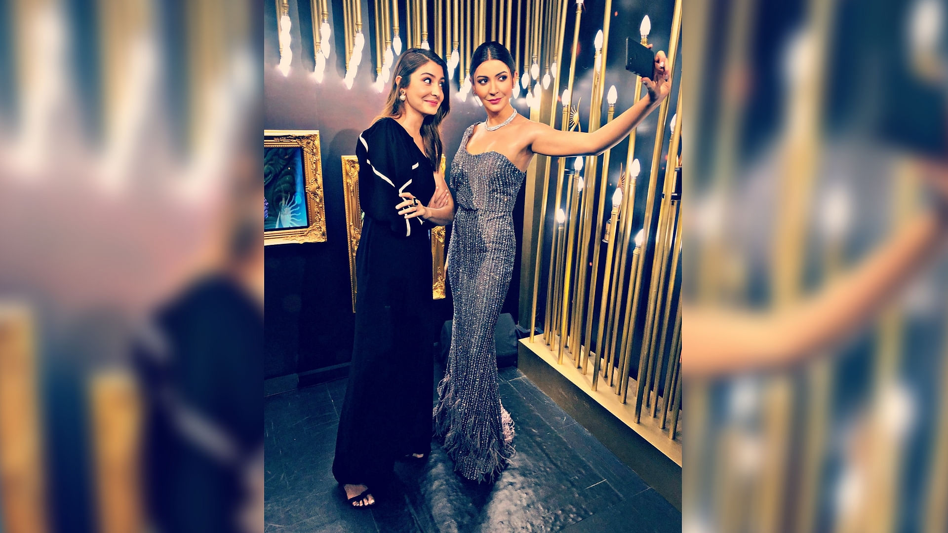 Anushka Sharma poses with her statue at Madame Tussauds in Singapore.
