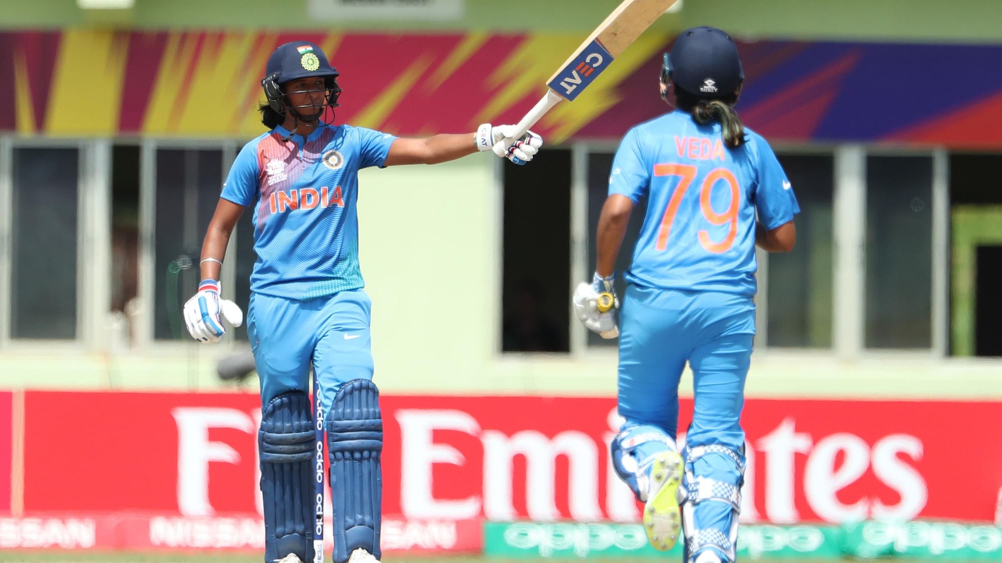 Harmanpreet Kaur celebrates after reaching a 100 in India’s WT20 opener vs NZ