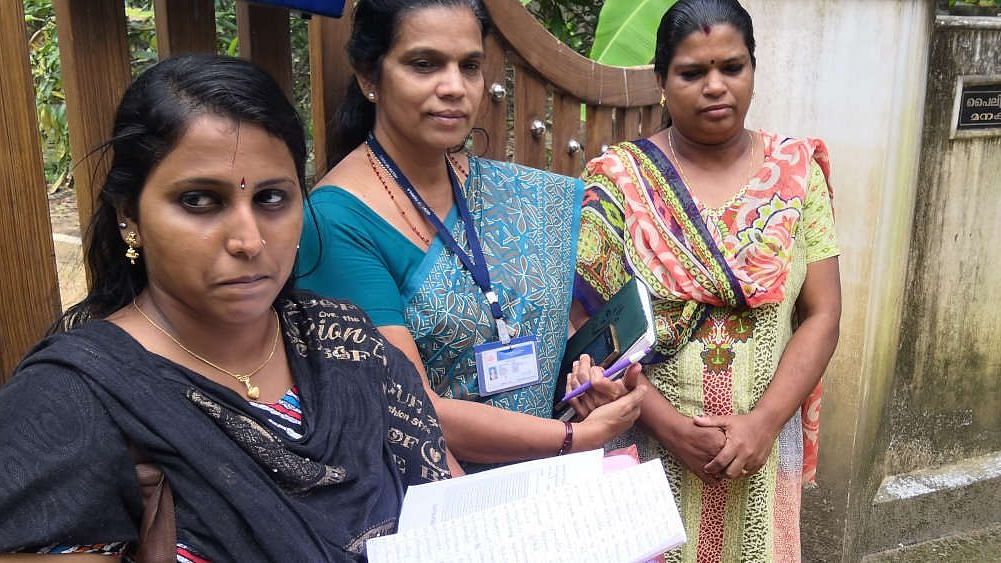 Volunteers like Jasmine Paulfin (left) and Sajitha (extreme right) helped ensure chlorination of wells and informed residents about consuming doxycycline tablets. Reethamma CA (centre) is a junior health inspector.