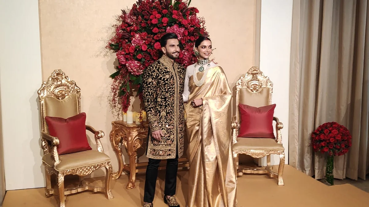 Ranveer and Deepika arrive for their wedding reception.