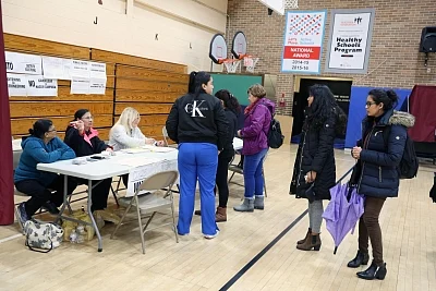 New Jersey: Voters line up to vote during the U.S. Midterm Elections at a polling booth in New Jersey, United States, on Nov 6, 2018. (Photo: Mohammed Jaffer/IANS)