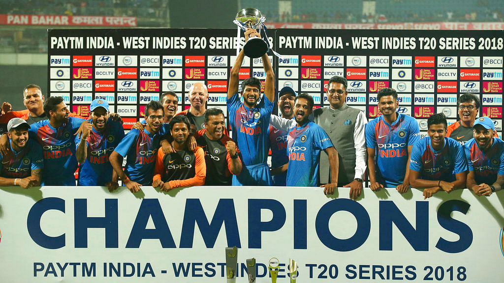 The Indian team celebrate their T20I series win over West Indies.