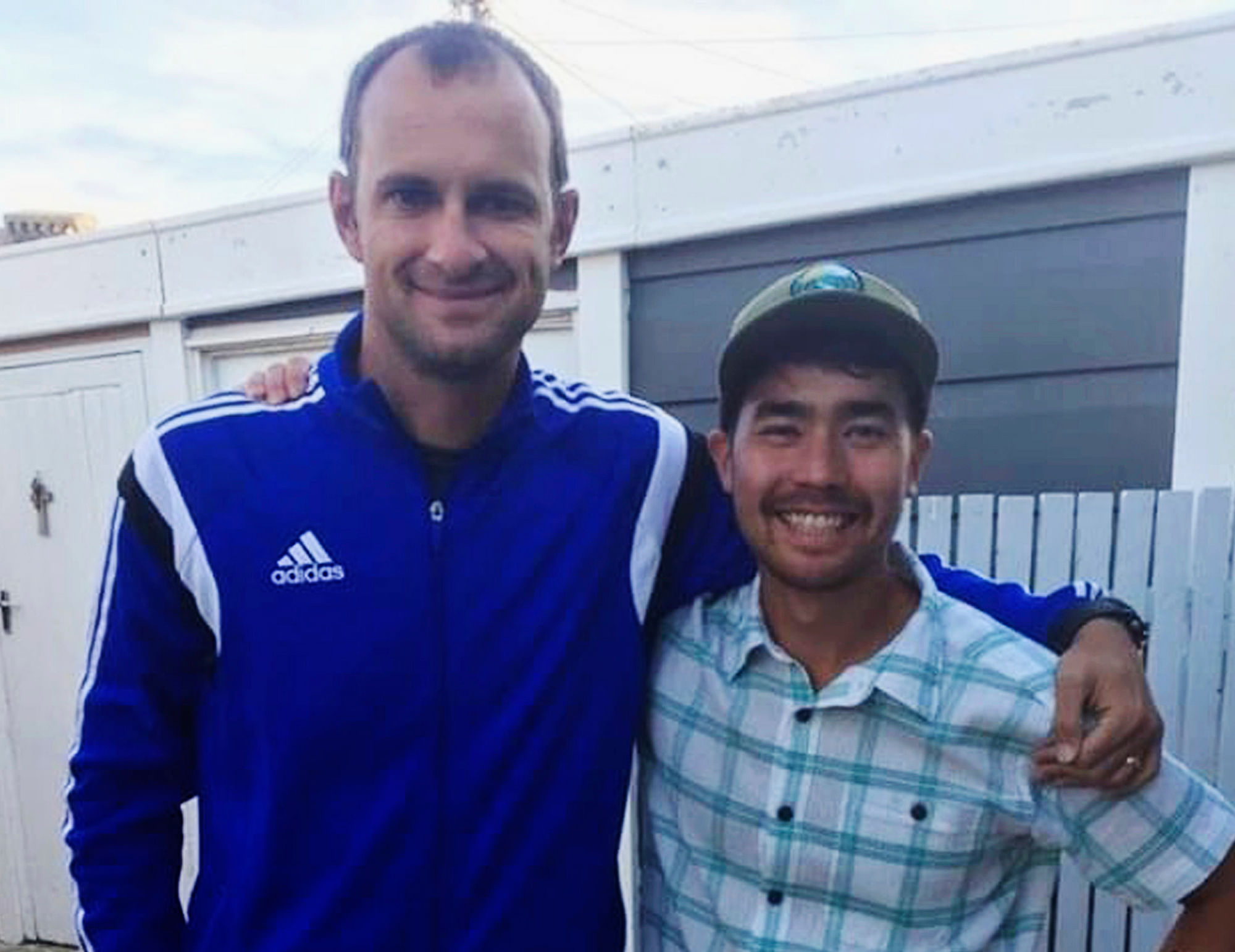 In this October 2018 photo, American adventurer John Allen Chau (right) stands for a photograph with his friend Casey Prince in South Africa, days before he left for the Andaman and Nicobar Islands.