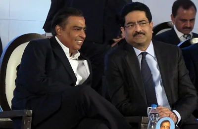 Bhubaneswar: Reliance Industries Chairman and Managing Director Mukesh Ambani in a conversation with Aditya Birla Group Chairman Kumar Mangalam Birla at the Make in Odisha Conclave 2018 in Bhubaneswar, on Nov 12, 2018. (Photo: IANS)