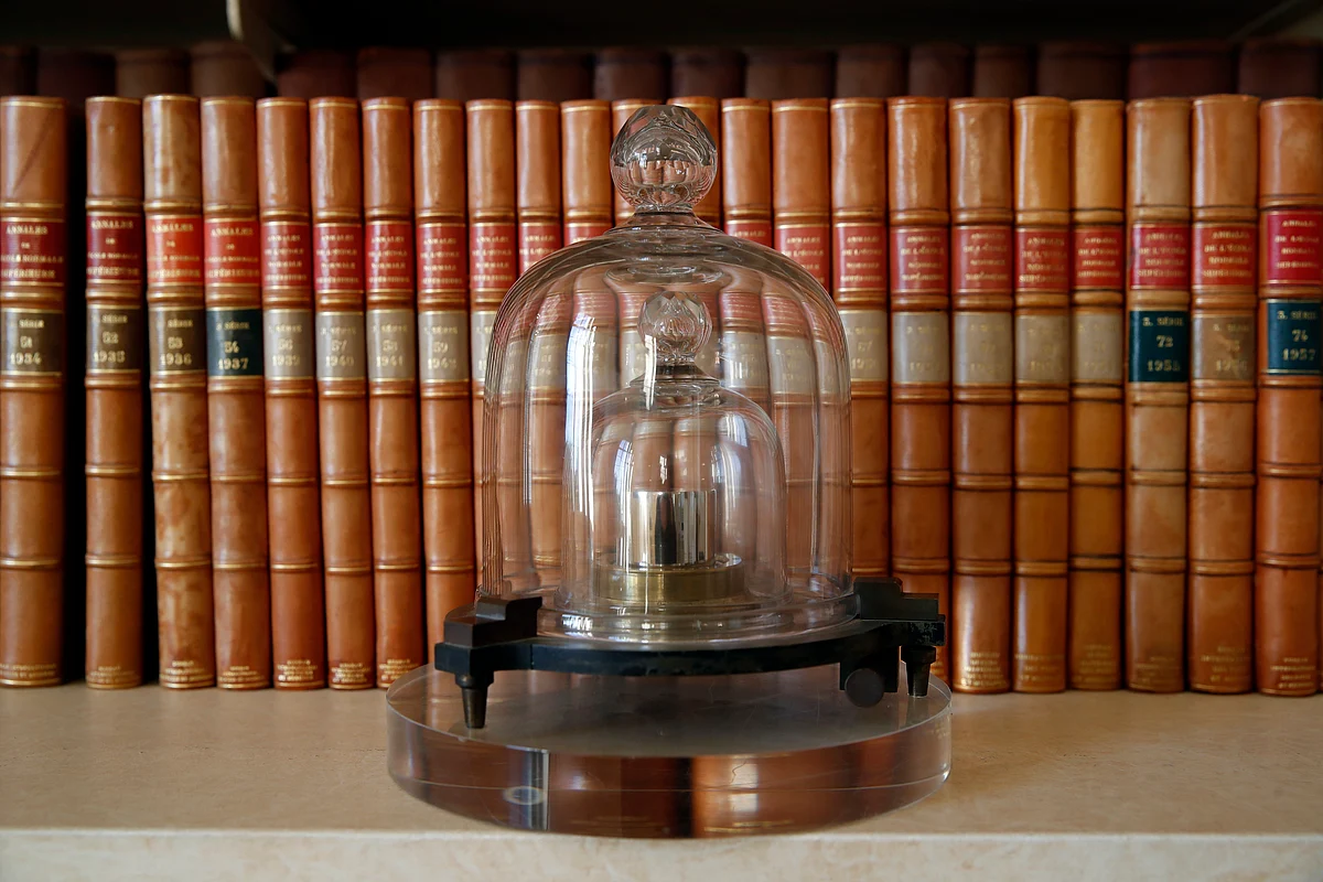 A weight is set up at the International Bureau of Weights and Measures, in Sevres, near Paris. 