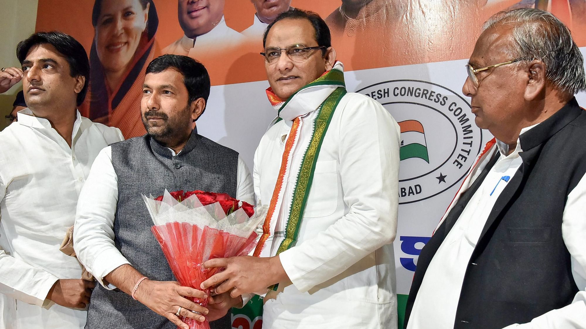 Former India cricket captain and newly-appointed Working President of Telangana Pradesh Congress Committee, Mohammad Azharuddin (second right), is felicitated in Hyderabad. 