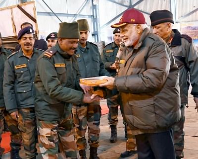 Harsil: Prime Minister Narendra Modi celebrates Diwali with the jawans of the Indian Army and ITBP at Harsil, in Uttarakhand on Nov 7, 2018. (Photo: IANS/PIB)