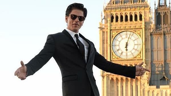 <div class="paragraphs"><p>Shah Rukh Khan in his signature pose.</p></div>