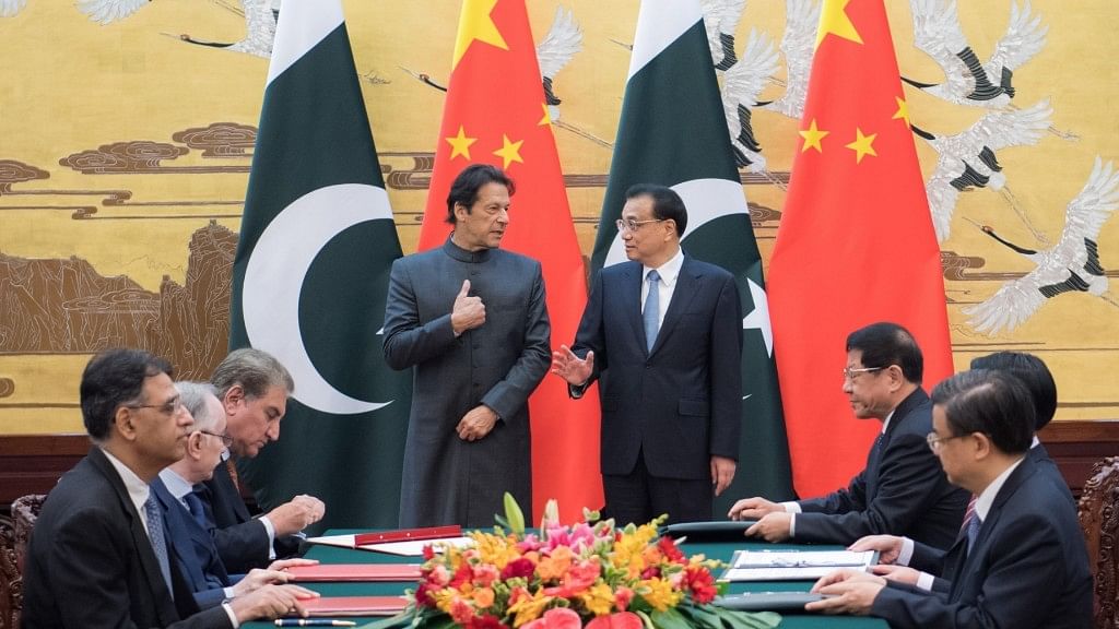 Chinese Premier Li Keqiang and Pakistani PM Imran Khan witness the signing of more than 10 documents on cooperation in areas including science research, justice, poverty reduction, health and customs.