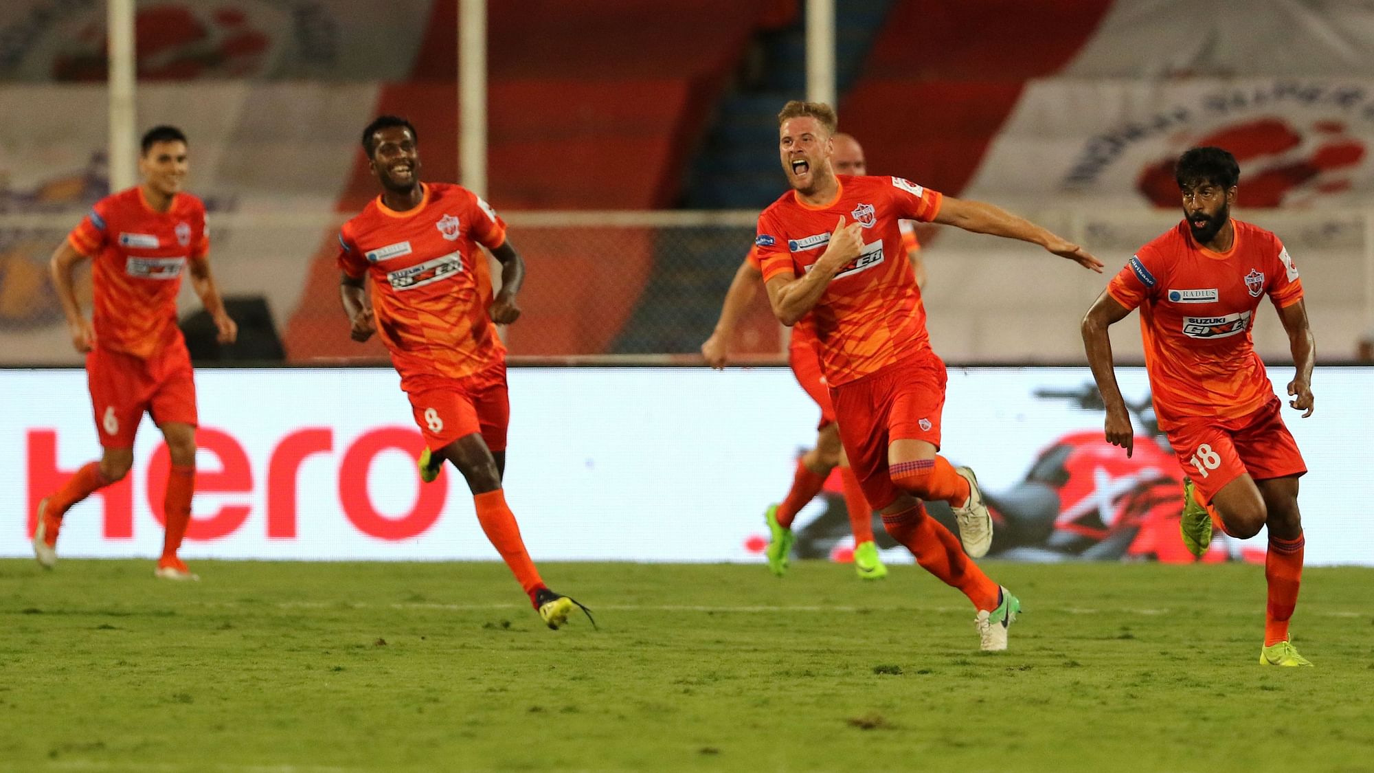 FC Pune City players celebrate their first ever success this season with a win against Jamshedpur FC on Wednesday.