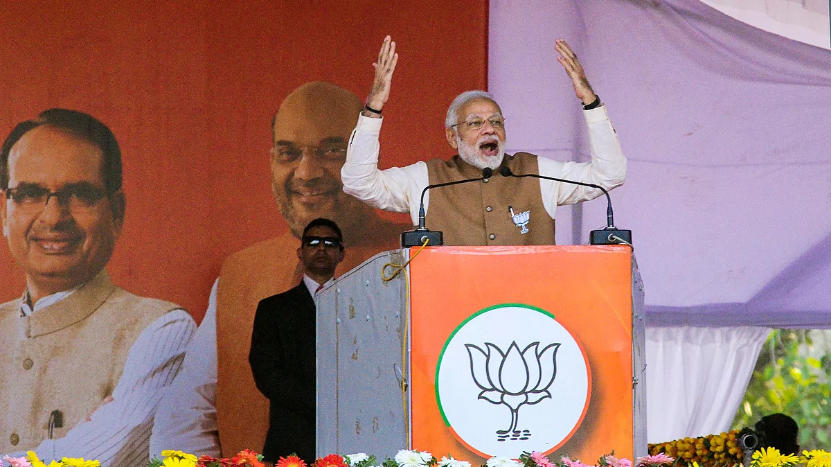 PM Modi addresses a rally in Rewa, ahead of Madhya Pradesh Assembly elections, Tuesday, 20 November.