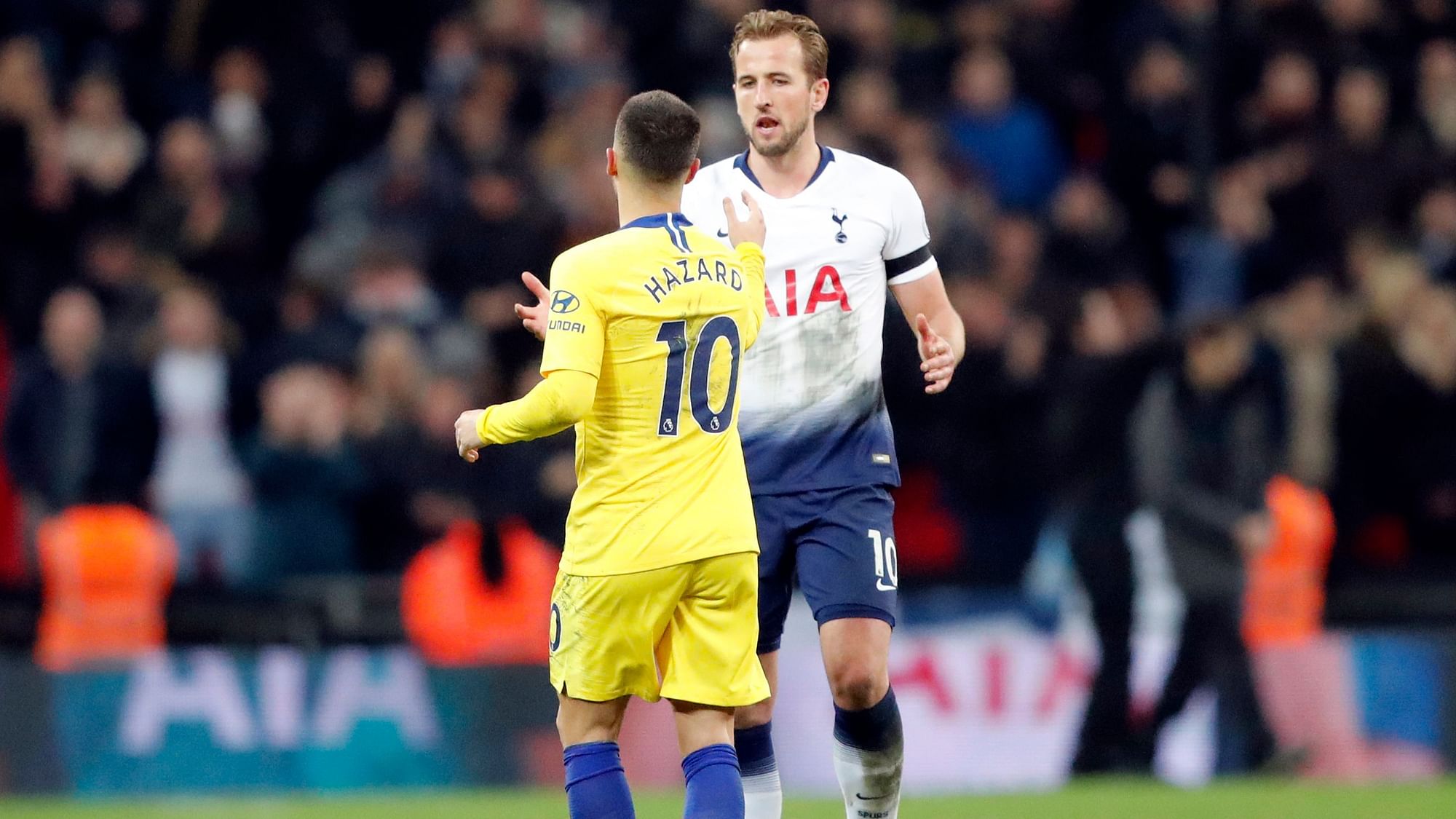 Tottenham’s Harry Kane (right) meets Chelsea’s Eden Hazard during the English Premier League  match between Tottenham Hotspur and Chelsea at Wembley Stadium on Saturday, 24 November.