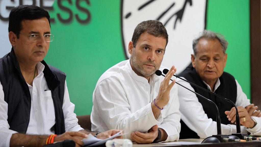 Congress President Rahul Gandhi (centre) with senior leaders Randeep Surjewala (left) and Ashok Gehlot (right).&nbsp;
