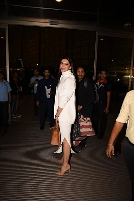 Mumbai: Actress Deepika Padukone arrives at Chhatrapati Shivaji International Airport as she leaves for her wedding with actor Ranveer Singh in Italy; in Mumbai on Nov 10, 2018. (Photo: IANS)