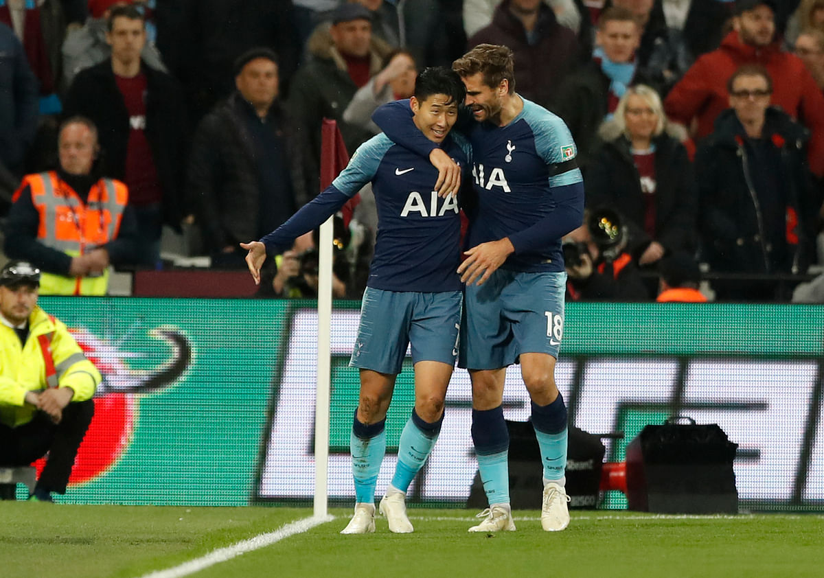 Son Heung-min burst out of a 19-game goal drought to help Tottenham into the English League Cup quarter-finals.