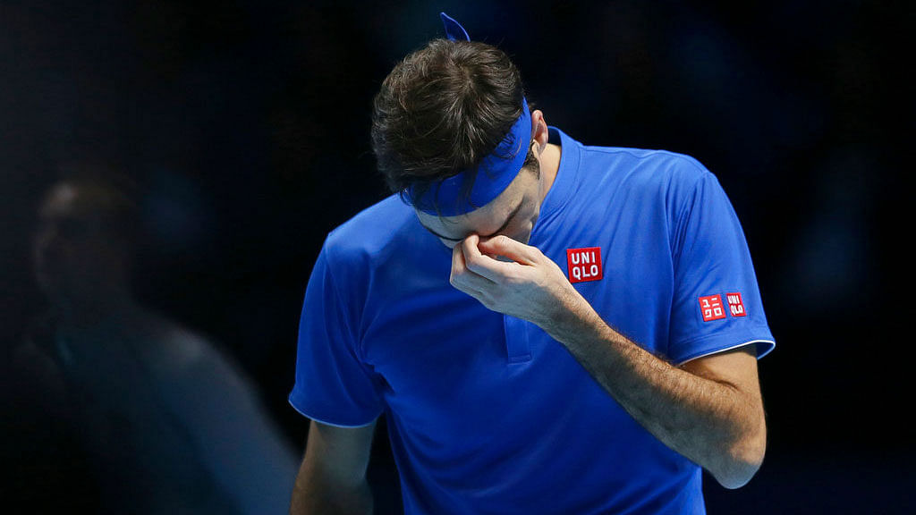 Roger Federer is dejected after losing a point against Alexander Zverev in the ATP Finals semis.