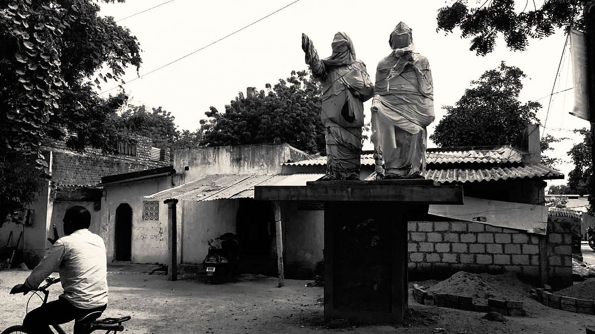 Statues of BR Ambedkar and B Babu Jagjivaram covered with cloths ahead of election in Nalgonda district in Telangana.&nbsp;