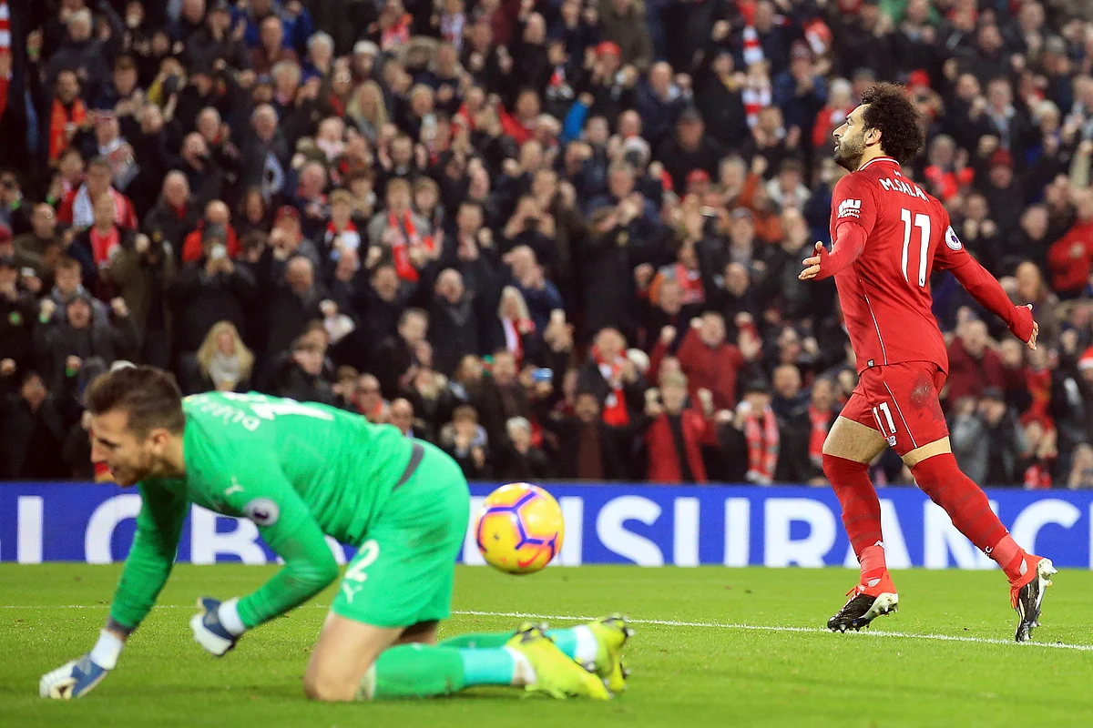 Mohamed Salah celebrates after scoring the second goal in Liverpool’s 4-0 win over Newcastle United in the Premier League.