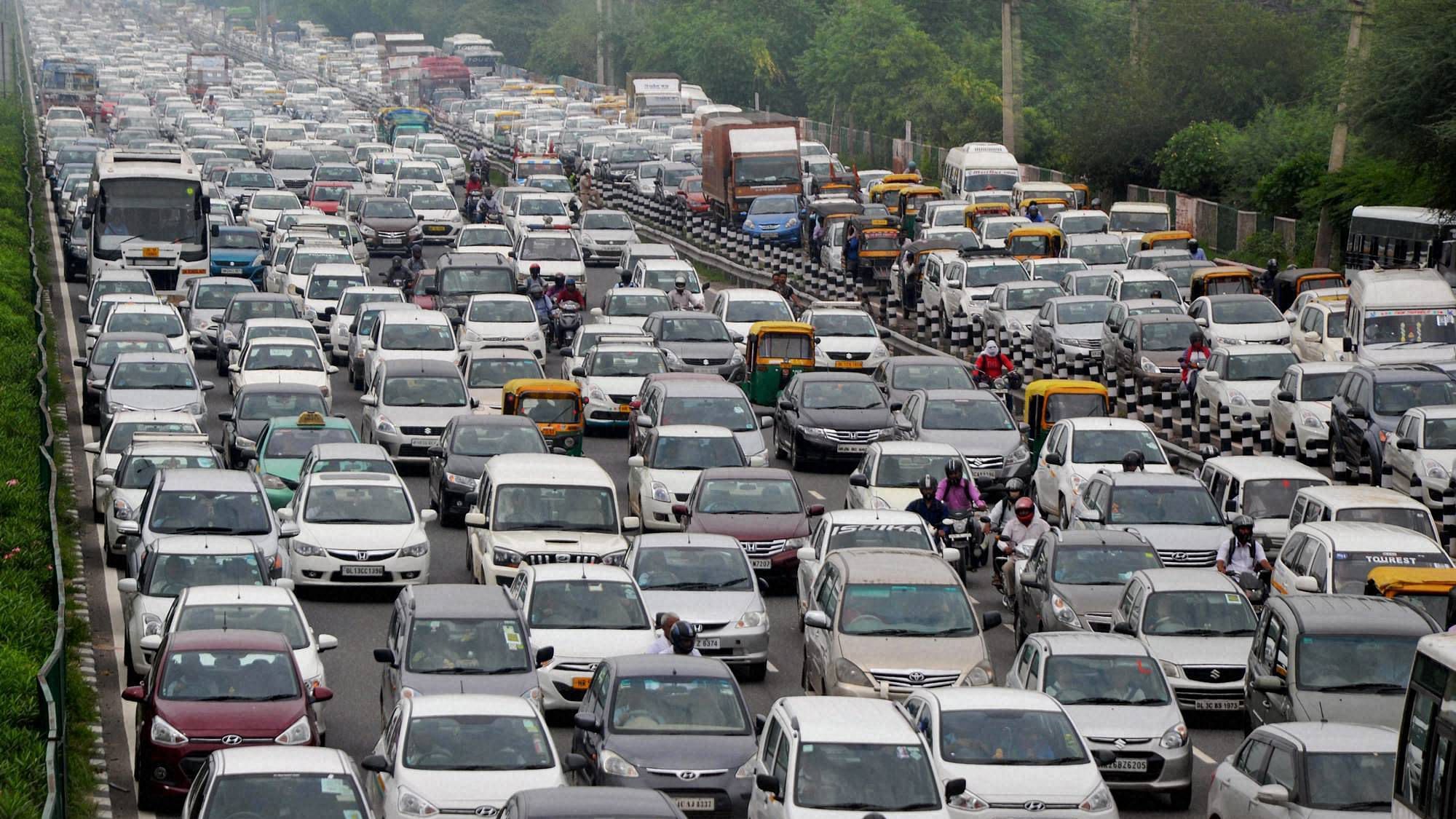Commuters stuck in heavy traffic jam. Photo used for representation.