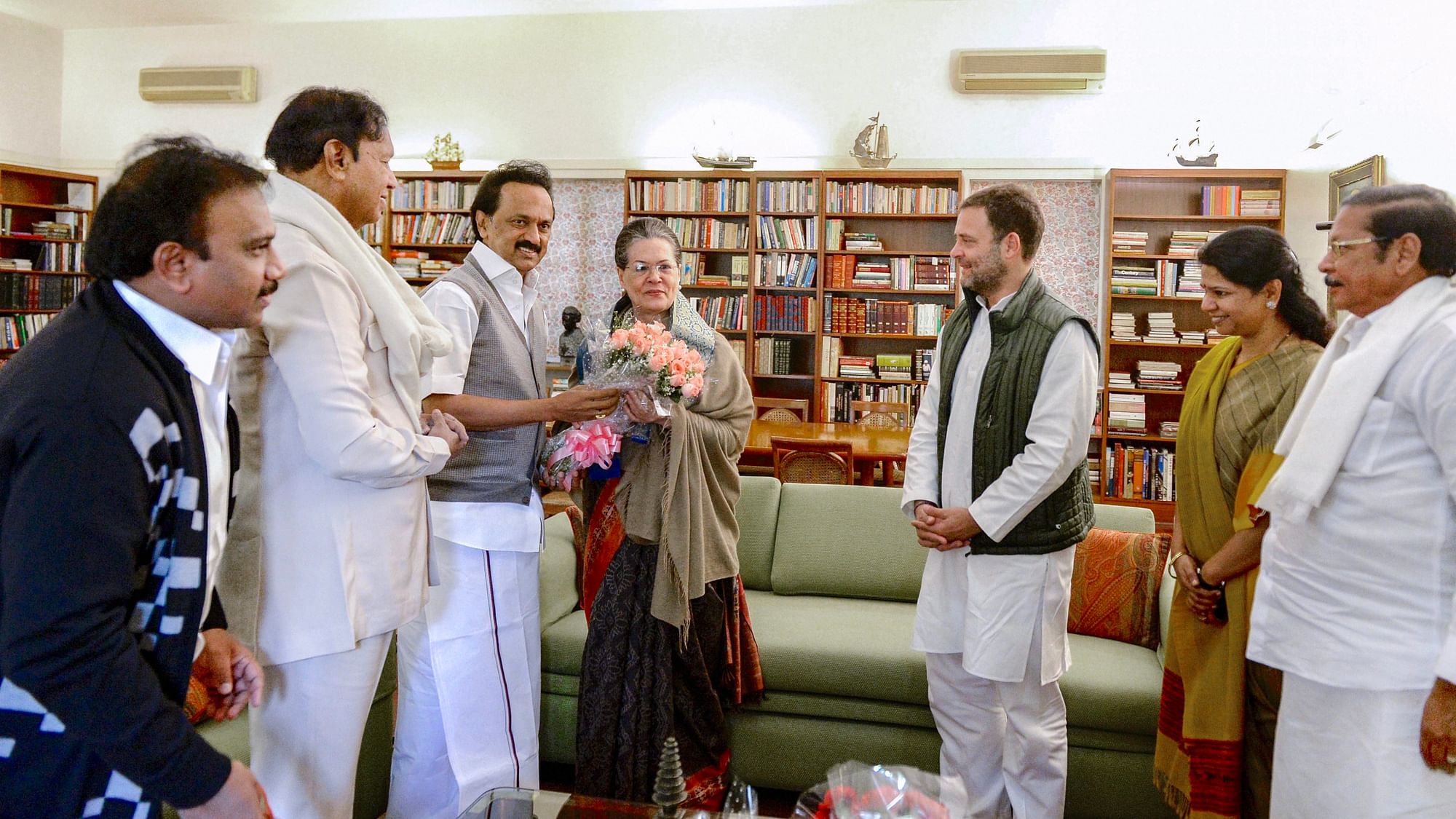 DMK President MK Stalin offers a bouquet to former Congress president Sonia Gandhi on the occasion of her birth anniversary, in New Delhi