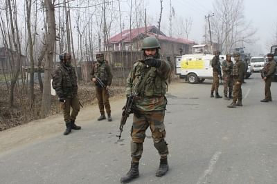 Srinagar: Security personnel after an 18-hour-long gun battle with militants that ended in Mujgund area on the outskirts of Srinagar on Dec 9, 2018. A Pakistani commander of the Lashkar-e-Taiba (LeT) terror outfit and two Kashmiri militants were killed by the Indian forces. The operation stretched for hours as militants kept on changing locations during the gunfight within the cordoned off area. (Photo: IANS)