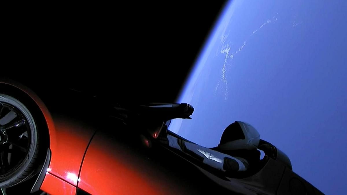 A Tesla Roadster with a space-suit wearing mannequin was placed in an Earth-Mars elliptical orbit around the sun by SpaceX. 