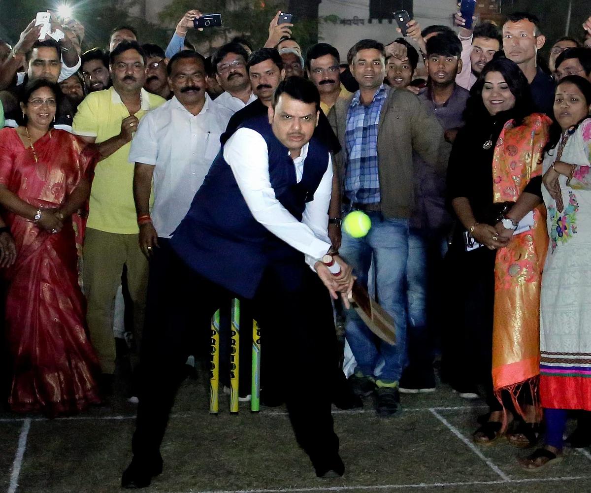 Maharashtra Chief Minister Devendra Fadnavis bats to inaugurate the 'CM Chashak' mega sports and cultural event, in Nagpur, Maharashtra, late Monday, Dec 3, 2018.