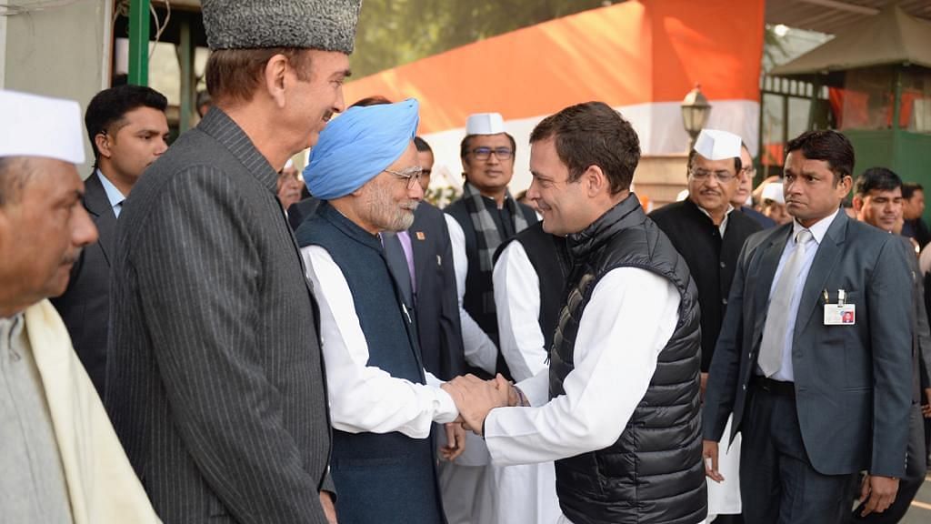 Congress President Rahul Gandhi greets former Prime Minister Manmohan Singh at the party’s 134th Foundation Day celebrations in New Delhi.