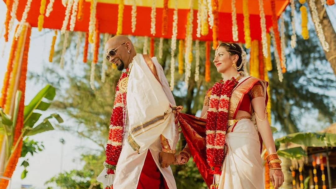Raghu Ram and Natalie Di Luccio get married.