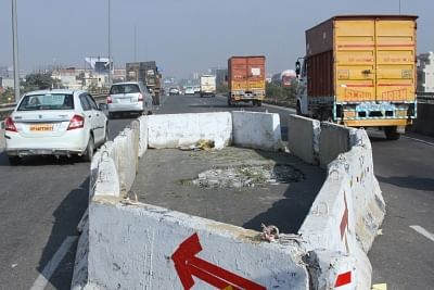 Gurugram: Traffic movement between Manesar and Gurugram was hit as a huge portion of the Rampura flyover on the Delhi-Jaipur national highway broke off and fell in Gurugram on Dec 17, 2018. The flyover was opened for traffic nearly two years ago. A portion of another flyover near Manesar and Hero Honda Chowk had fallen down earlier in 2018. (Photo: IANS)