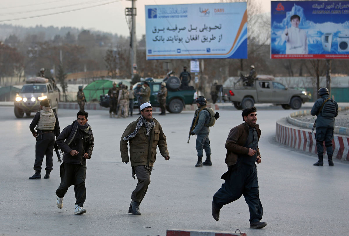 Militants detonated a car bomb before storming into a Kabul government compound.